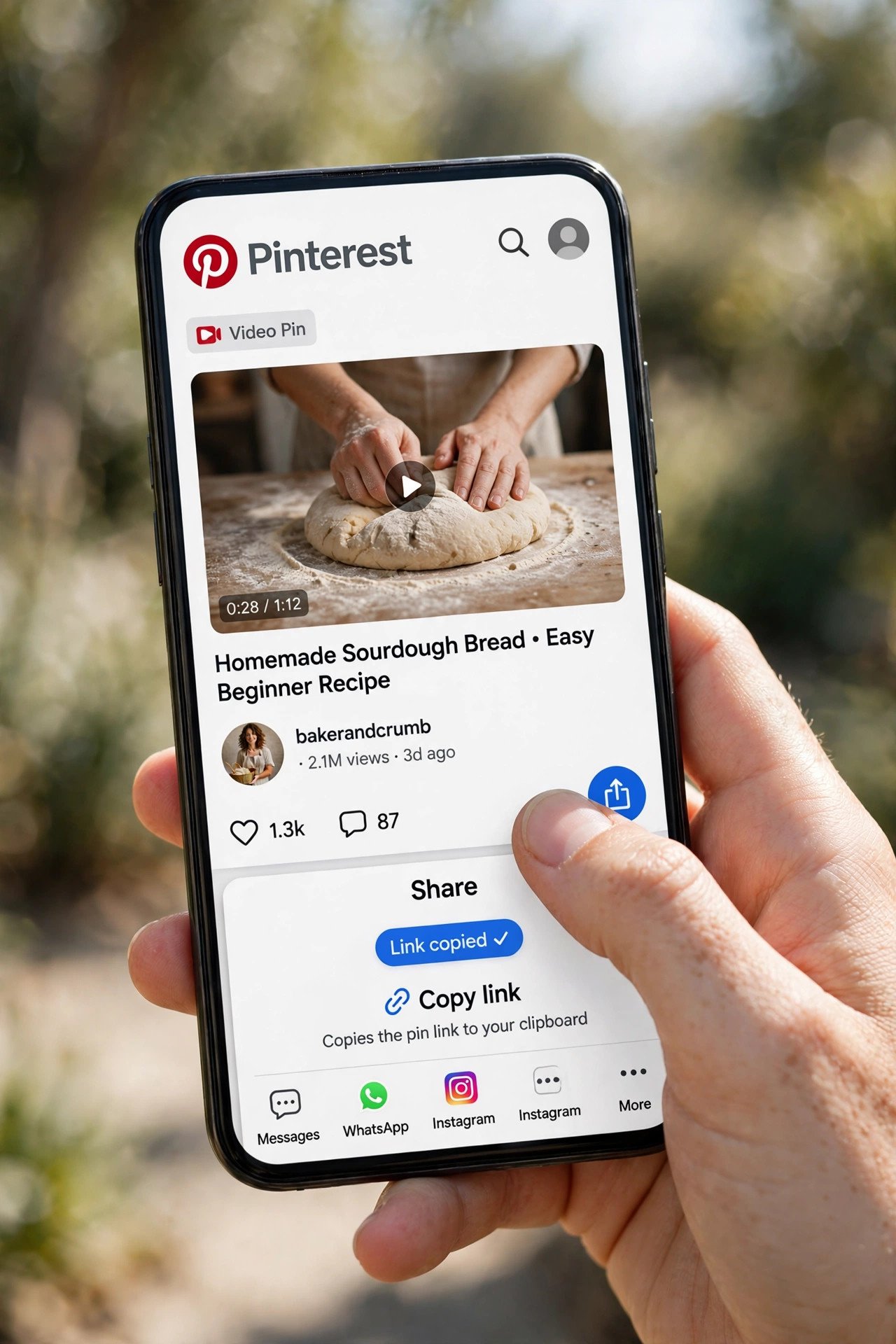 Tapping share and copy link on a Pinterest video pin on a phone, the first step to download Pinterest video with an online tool